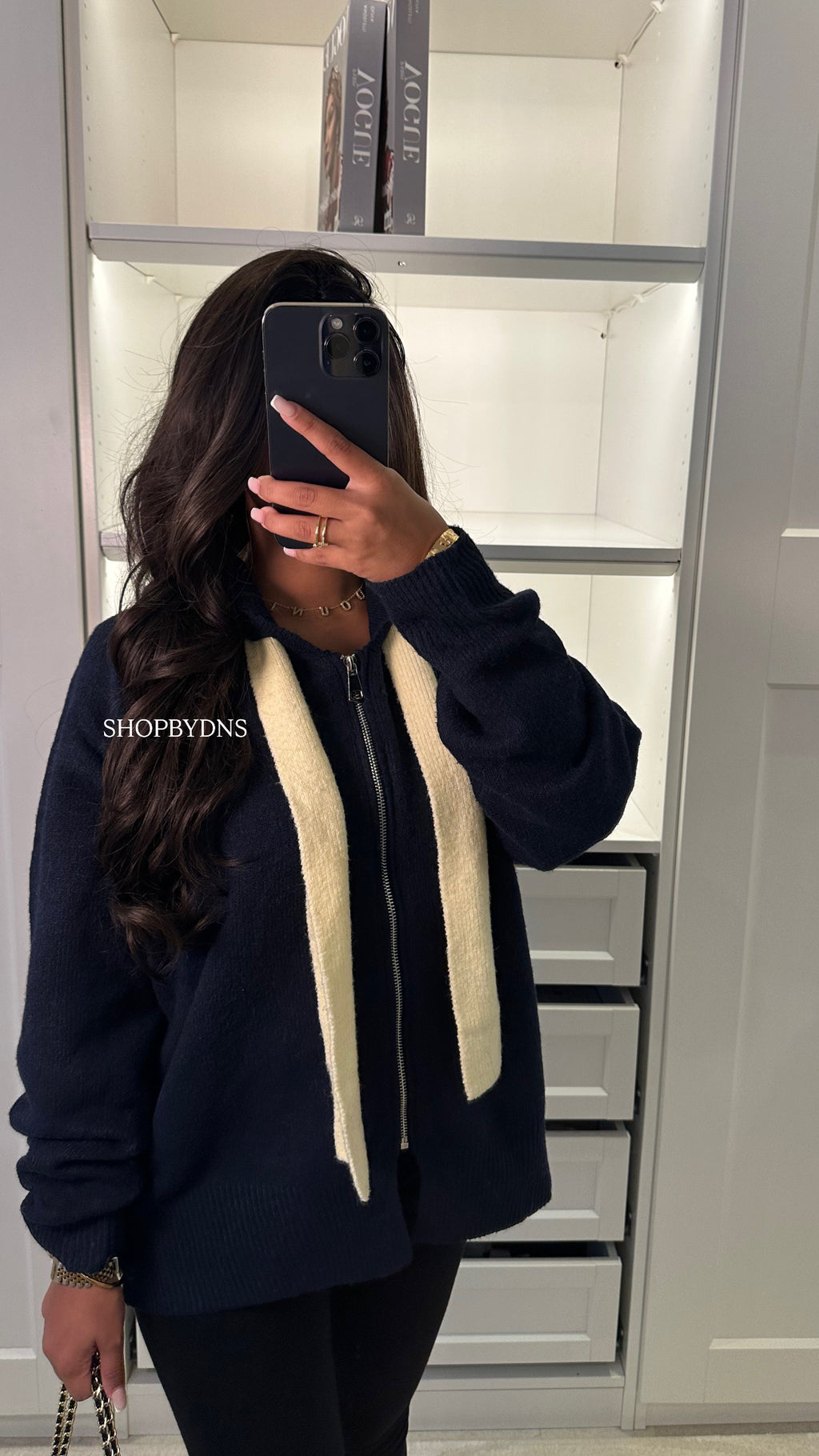Gilet en maille à capuche