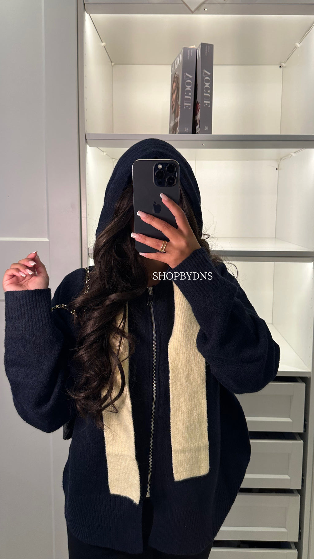 Gilet en maille à capuche