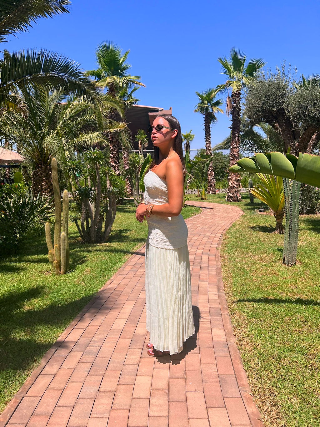 Robe longue bustier texturé à jupe plissée